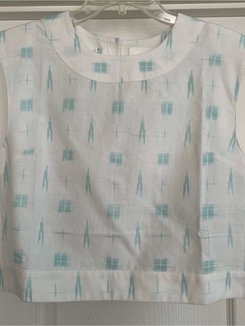 Sleeveless White Top with Aqua Ikat Print